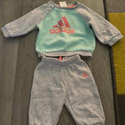 I have for sale a lovely grey and green matching adidas tracksuit.

It has been worn so does have some minor signs of wear and tear (wash wear) but nothing major.

Size- 3-6 months 

Collection from Lancing or I can post for extra