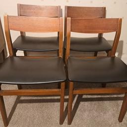 Set of 4 Authentic Mid Century Modern Dining Chairs.
In good solid original condition with age related marks / patina and seat covers in good condition with no rips or tears, etc, as pictured.

Height-76cm Seat Height-44.5cm Width-48cm Depth-43cm

Can deliver locally for a fee.

Please view my other items by clicking on my name. Thank you.