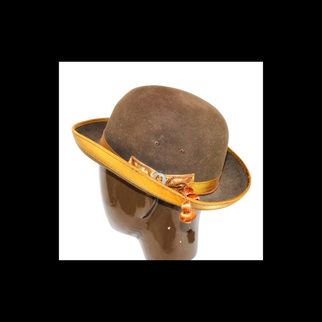 Normally £172 Rare
Size 2 1/2 (54-55 cm )

Vintage Borsalino Calidad Superior Peru Tassel Bowler Hat
in immaculate condition
And Italian take on the classic bowler hat,
this time with a satin band and Peru tassles.
Unspeakably stylish and suitable for both sexes.
Although vintage, this bowler has not been worn.
The hat measures 21 inches around the inside rim.

Borsalino is the oldest Italian company specializing in the manufacture of luxury hats. Since 1857, the manufacture has been based in Alessandria, Piedmont. The founder, Giuseppe Borsalino, is remembered for creating a particular model of felt hat that has come to be known eponymously as a "borsalino