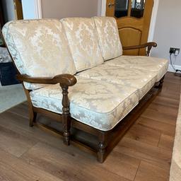 Beautiful Ercol settee and 2 armchairs, old colonial style in golden dawn finish. Seats covered in ivory / cream fabric . Slight wear on wooden arms see pictures . Recently re webbed .