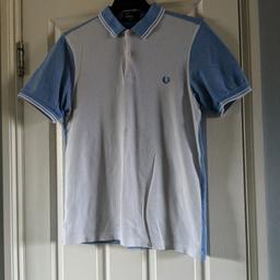 Fred Perry size M slim fit polo top. worn but in great condition. collection only. white front baby blue sleeve and back.