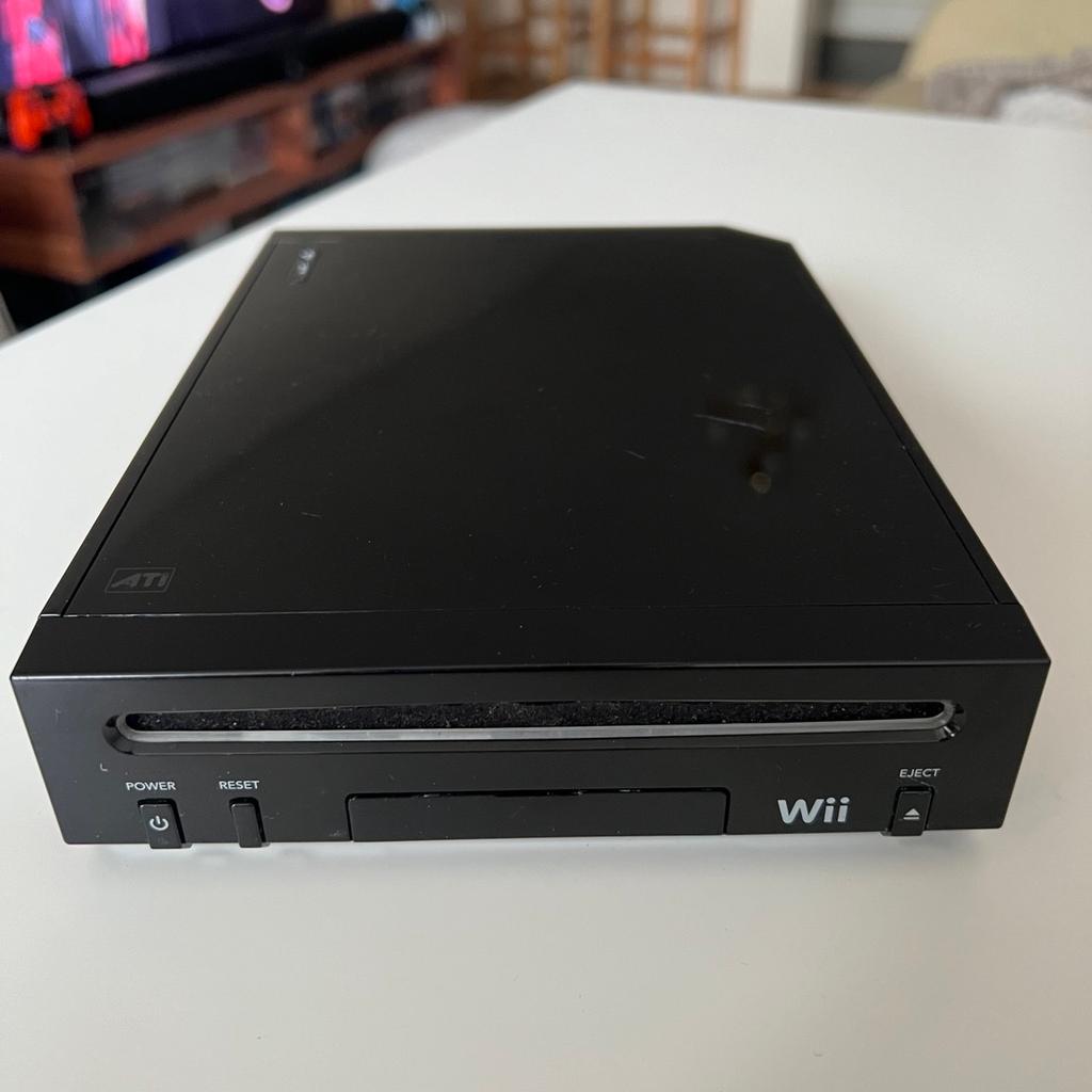 Nintendo Wii console family edition console only.

In good working condition. Some signs of wear.