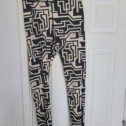 abstract patterned leggings. long length. elasticated waist so is larger than size 16-18