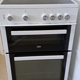 PICK UP ONLY

H=90cm W=60cm D=60cm
 Free standing beko electric cooker with ceramic hob, grill, and fanned oven. There is an interior light in the main oven.The oven door is left hinged. Everything is working very well. There is a small peeling of paint under the right side of the knobs.