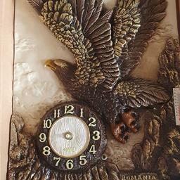 A very heavy crafted picture. Has a clockface but no needles but can easily be replaced. 

Great as a ornament piece or on the wall

Heavy quality item