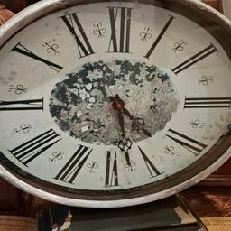 Large metal clock - heavy and sturdy. Made to look old. In good working order. It measures almost 1 ft 6 inches high x approx 1ft 4 inches wide. Collection only from Stourbridge. Delivery/postage is not available.