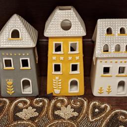 A lovely set of three ceramic house t- light holders in good used condition. The taller one stands approx 6.5 inches high, and the other two stand approx 6 inches high. Collection only from Stourbridge. Delivery/postage is not available.