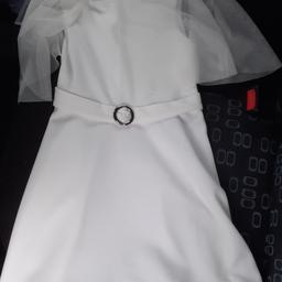 4-5 years dress, height 110cm. White. Never been used. brand new without tags. collection or if local delivery for a small charge.