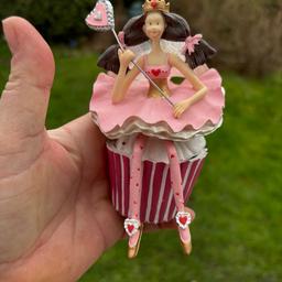New pretty fairy shortcake trinket box. Still has box but not much packaging. Had many years not used just been in box which is a shame. This is pink strawberry cupcake . Lovely item . Please see the other two I have in seperate listings .