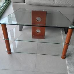 Demagio Corner TV unit.
 Three glass shelves to house all your TV tech.
Medium brown wooden legs. Excellent condition, as new.
Dimensions - 80cm w x 40d x 50h
collection only
