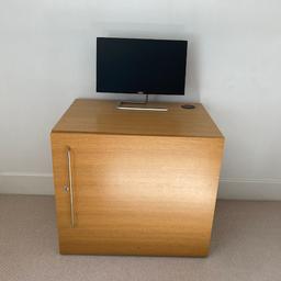 Oak veneer hideaway workstation / desk sold by John Lewis. Suitable for office / study / bedroom / hallway / etc. Features: separated sections at range of heights; space for, e.g., computer tower; drawer; cable management holes; sturdy metal handle and wheeled opening section.
Collection only