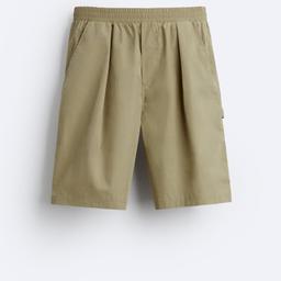 Zara technical bermuda shorts relaxed fit, elasticated waistband front pockets and rear patch pockets, patch pocket with multi porpuse strap on the leg. Size M