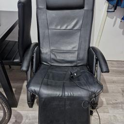 Leather Massage Chair Adjustable Foot rest. 
As seen in pictures