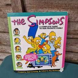 The Simpsons. A complete guide to our favourite family. Characters, episodes, and secret jokes you might have missed. 
Corners have curled in the front. Creased back cover.