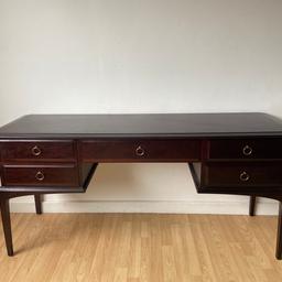 Vintage, Stag Minstrel dressing table - desk
With original, Brass ring pull handles.
With toughened glass top.
In good condition.
I can arrange Nationwide delivery using trusted courier.