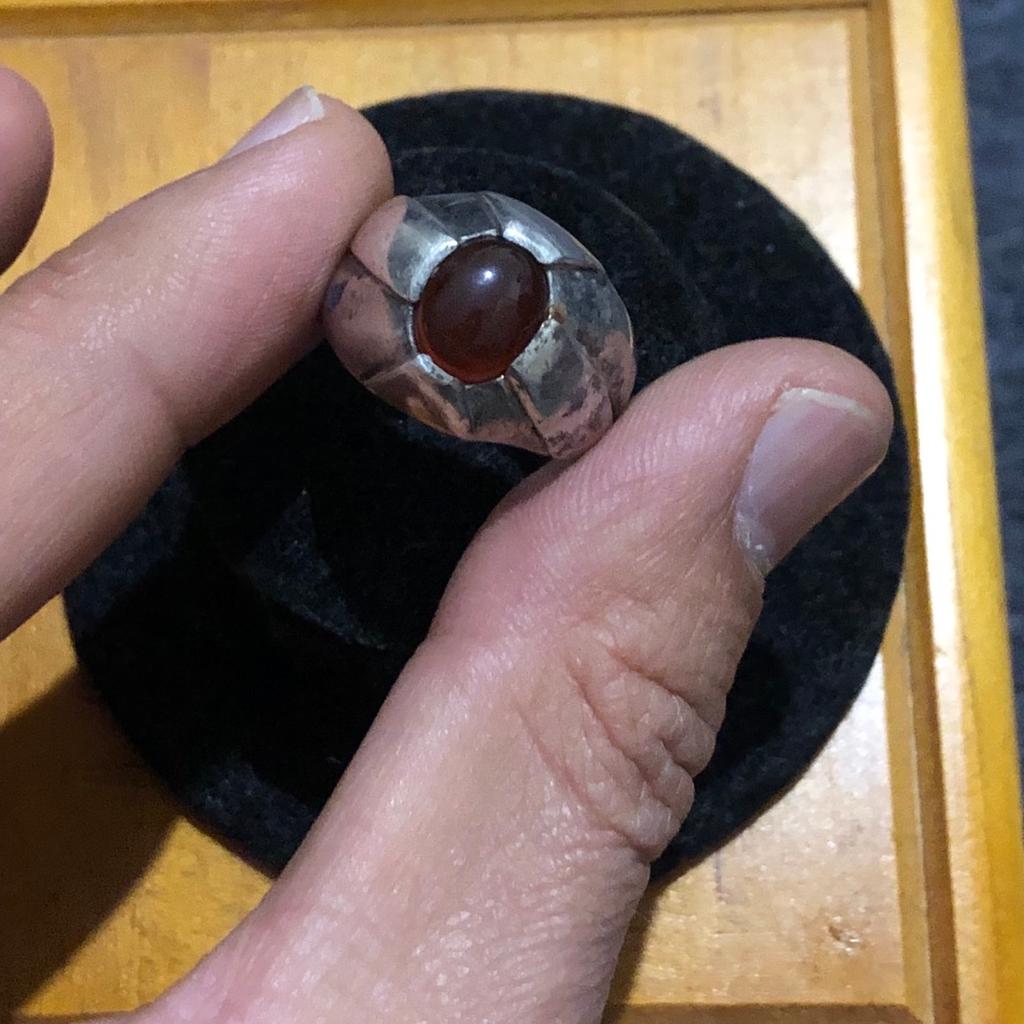 Old vintage hallmarked 925 silver ring and stamped Akid with genuine natural red agate / aqeeq stone . In good condition pls look at the pictures attached for more details can accept PayPal,collection,bank transfer or delivery if close by. Shpocks wallet too