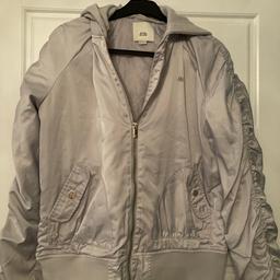Grey river island bomber jacket immaculate condition apart from one tiny bit of stitching come away as shown on the photo easily fixed cost £50