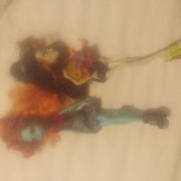 a skeleton and loch Ness monster high dolls