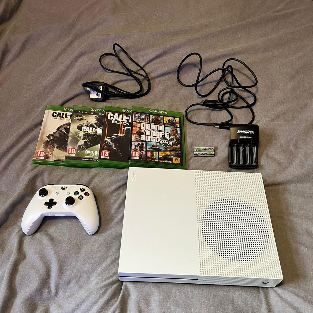 Microsoft Xbox One S 1 TB White
Controller Included
HDMI Cable Included
Power Supply Cable Included
4 Games Included
- GTA 5
- Call Of Duty Black Ops 3
- Call Of Duty Infinite Warfare (Legacy Edition)
- Call Of Duty Advanced Warfare
Comes With 2 Rechargeable Batteries and a Rechargeable Plug.

Doesn’t include its original box. Console is in excellent condition with no dents or scratches. Controller works perfectly fine and is in Good condition.
However the rubber on the left analog stick of the controller has been worned-out but works perfectly as it should.