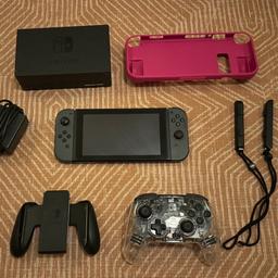 Nintendo switch for sale with extra Nintendo controller.

Removed screen protector to take these photos so the screen is perfect - no scratches at all.

Comes with the charging block that came with the device, HDMI cable, case and charging cable for controller.

Couple of games for sale on seperate posts (Zelda and Skyrim)
