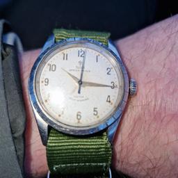 I'm aware that it is 1957. it has a rolex winder which I believe is original and stamped tudor. the strap is obviously after market. it is not working but winds up,everything moves freely inside. it has been sat for many years.
