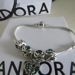 brand new pandora charm bracelet and 5 emerald charms all ale and 925 silver in giftbox and bag unwanted gift paid over £250