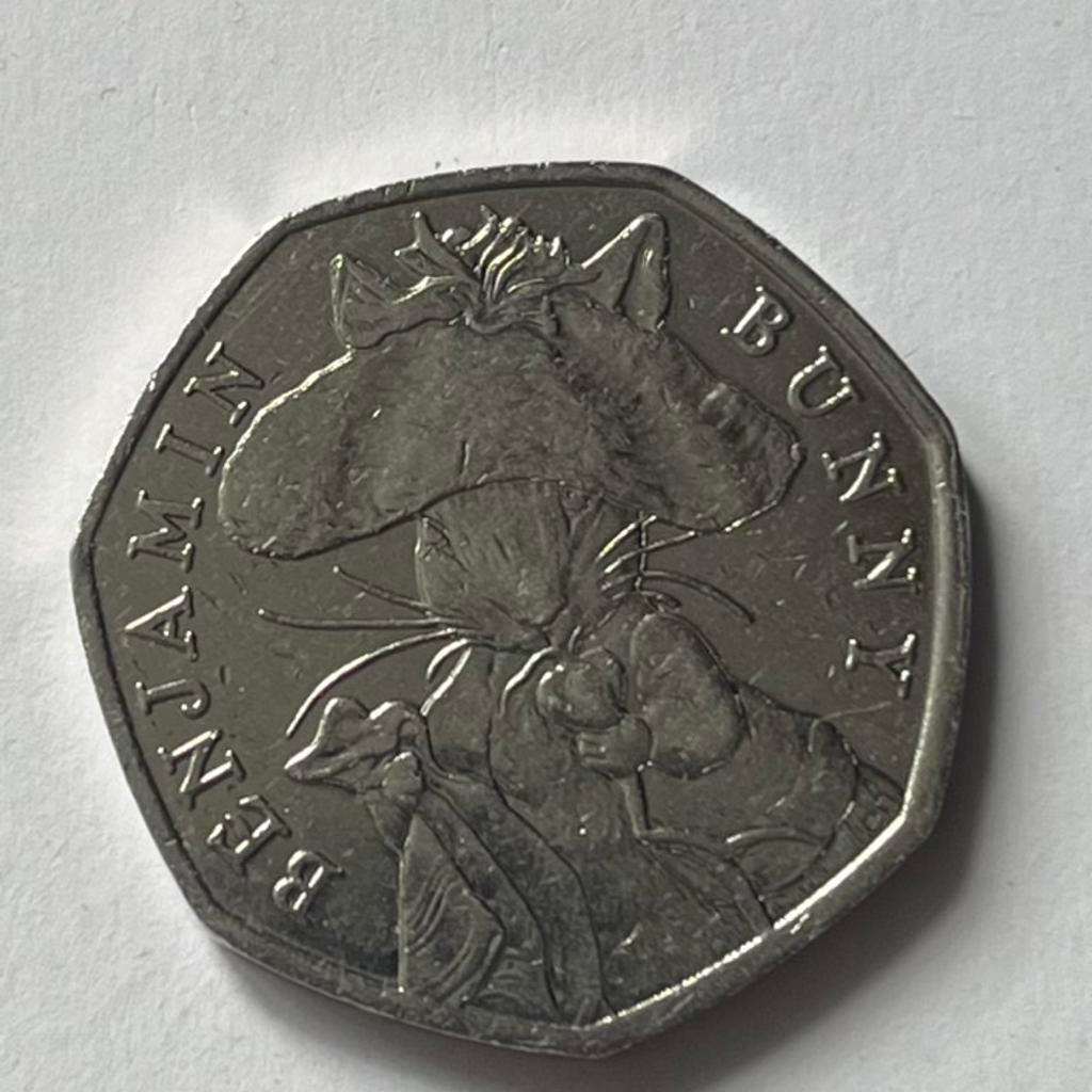 This is a rare Benjamin Bunny 2017
Queen Elizabeth 50p coin. This lovely coin features the popular character from Beatrix Potter's children's books and are a great addition to any coin collection. The coin has a denomination of 50p and is part of the British Decimal Coinage series. Add this coin to your collection today! Great condition