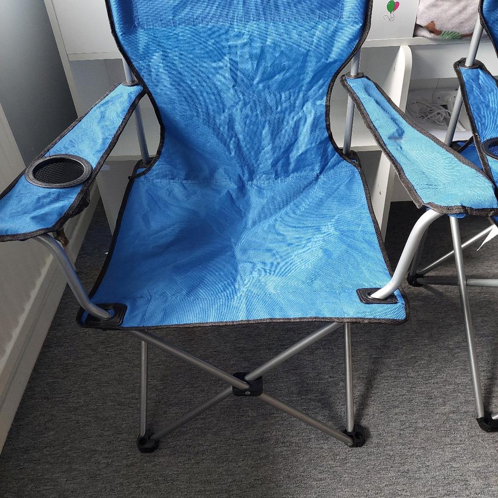 Two blue fold away chairs.
One has a slight fraying but holds weight fine.