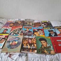 a variety of elvis presley albums and books in good condition