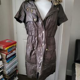 Khaki green sleeveless parka coat from River Island in size 8. It used t9 have sleeves but those have been cut off