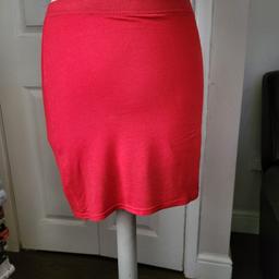 Red mini skirt from Boohoo in size 8. Hardly used