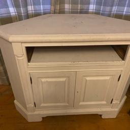 This is a very well made tv unit not your usual cheap flat pack could do with paint or sand back to oak finish or even jet wash it