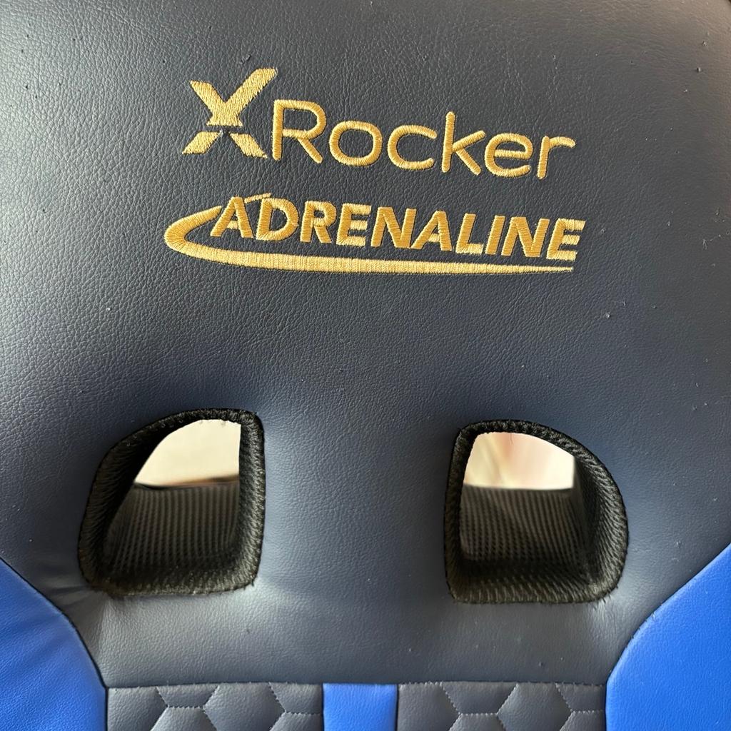 X Rocker Adrenaline V3 2.1 Bluetooth Audio Gaming Chair

14 months old. Used about 4 times. Few claw marks from cats as shown in picture.

“The X Rocker Adrenaline features a 2.1 Bluetooth ready control panel and sound reactive vibration motors for immersive audio while gaming, watching movies or listening to music through your mobile device. The Adrenaline is also compatible with PlayStation, Xbox and Switch gaming systems via a wired connection when using a TV headphone socket.
2.1 audio speaker system - Features 2 speakers mounted into the headrest for increased audio immersion, and connects to all your favourite games consoles and audio devices.
Bluetooth ready - Connect to mobile devices or Bluetooth ready PC's for low-latency audio. Also connects to consoles using the wired connection mode.
Sound reactive vibration - Feel the action in your favourite games, movies and music, with impactful vibration motors that reacts to impulses in audio.
* PS4 compatible.
* Xbox one compatible.