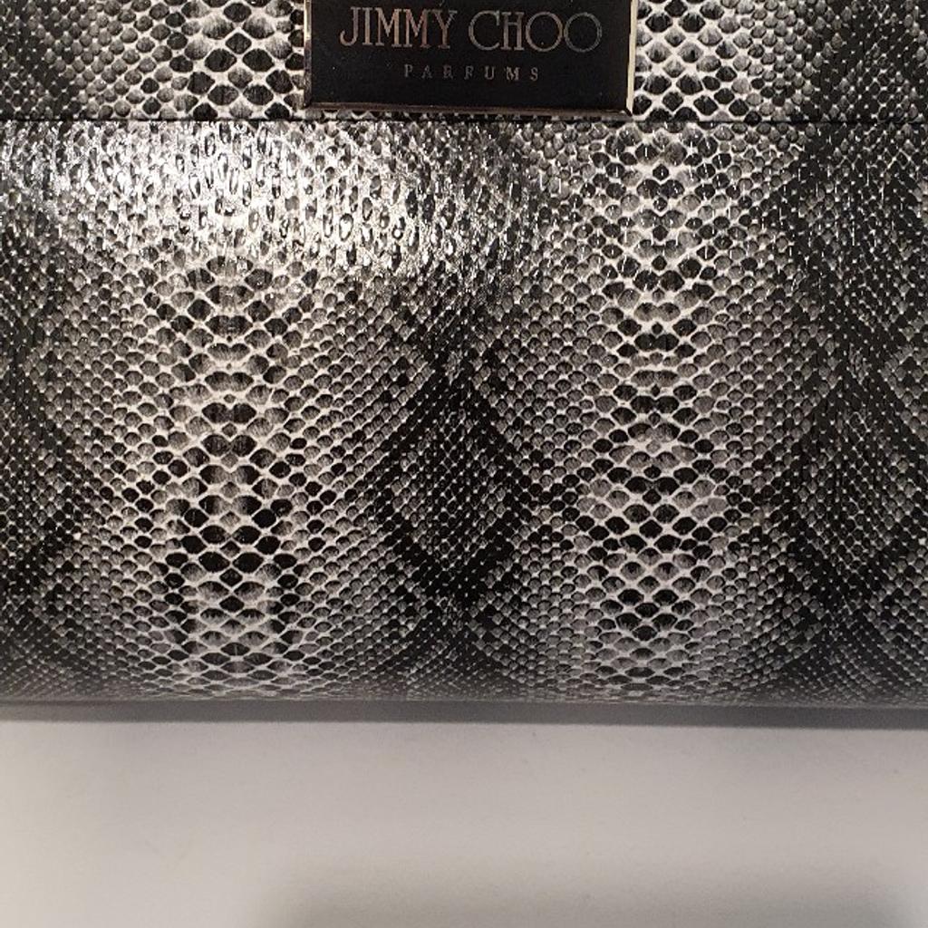 Jimmy Choo Parfum
Schwarz Schlangenleder Limited Edition clutch
Bag Geldbörse
25×12