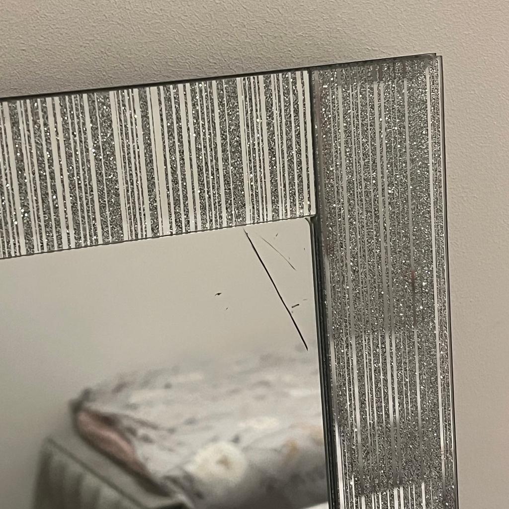 Beautiful mirror
Slight mark in the corner, not an actual crack