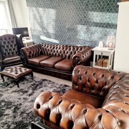 Real Leather brown Chesterfield sofa set including foot stool and hight back armchair.
Good condition, cleaned and steamed regularly. 2 studs missing on 3 seater does not affect seating.
ONO negotiable. Must go ASAP.