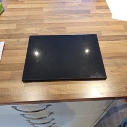 Black granite/marble counter saver/chopping board. Measures 31cm x 41cm x 1.5cm. Weighs 5.2kg - hence collection only.

Any questions please ask.