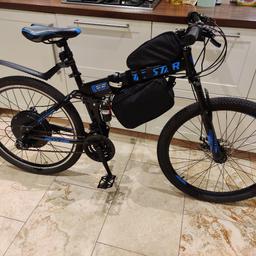 1500w folding e-bike. Can reach speeds of up to 30mph.

Can fold in half for easy storage. Dual suspension for a comfortable ride.

Bike frame itself is in very good condition. The electric motor kit is brand new. Only used to test ride so far.

48v battery.