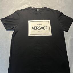 Used 

Good condition 

Please see images no rips or tears- however deodorant marks slightly visible. This can be removed if soaked and washed. I don’t have time.

Men’s Versace black chest logo T-shirt

 large size