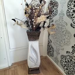 large ceramic floor vase with artificial stems and glass flowers. 58cm tall and 14.5cm width. still in excellent condition no damage or scratches on the vase