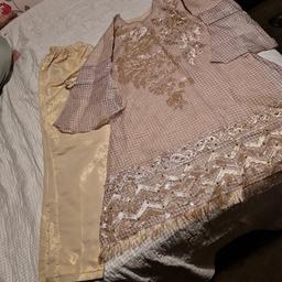 it's party dress never worn look good and new shirt light purple and gold color trouser