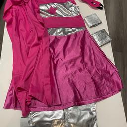 Super hero girl dress
Includes:
Dress
Cape
Cuffs
Mask
Boot cover
Size 8-10 years old
Very good condition 
Collection or delivery (+fee) available