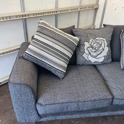 Good clean condition two seater sofa black and grey includes the cushions . . Can organise delivery local for £15