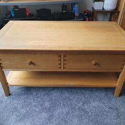I have this great Oak Beech Solid Coffee Table with 2 draws and a bottom open shelf, it's very nice for any living room, I do have a protective Glass top to protect wood from getting scratched that is £15 extra.