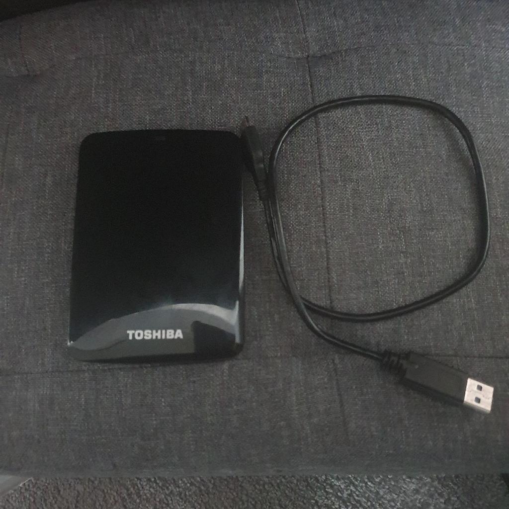 I have this portable Black Toshiba 1tb external hard drive, comes with box and manuals, and cable, big storage of 1tb so plenty of music and videos to store, can be used for xbox and playstation too.