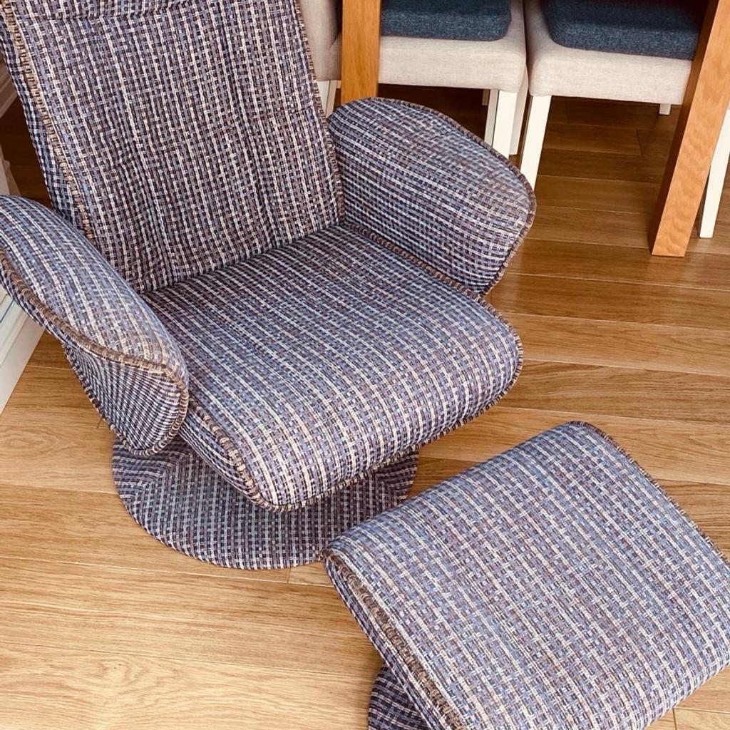 Gray recliner swivel chair with foot stool in good condition no damage or rips