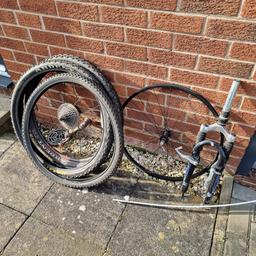 I have a few bike parts for sale. The forks came off a Mongoose MTB and have had very little use (Mozo ML30). The bare wheel is 57cm diameter and in good condition.  The Maxxis tyre and wheel are size 26 x 2.25 and are in good condition and the tyre on its own is size 26 x 1.75. I'm open to offers. Give me a shout if yoi are interested in any of them.