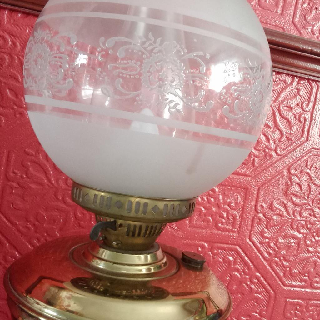 Antique brass oil lamp with glass shades, mint condition tall, cost alot so bargain no offers at all

£80