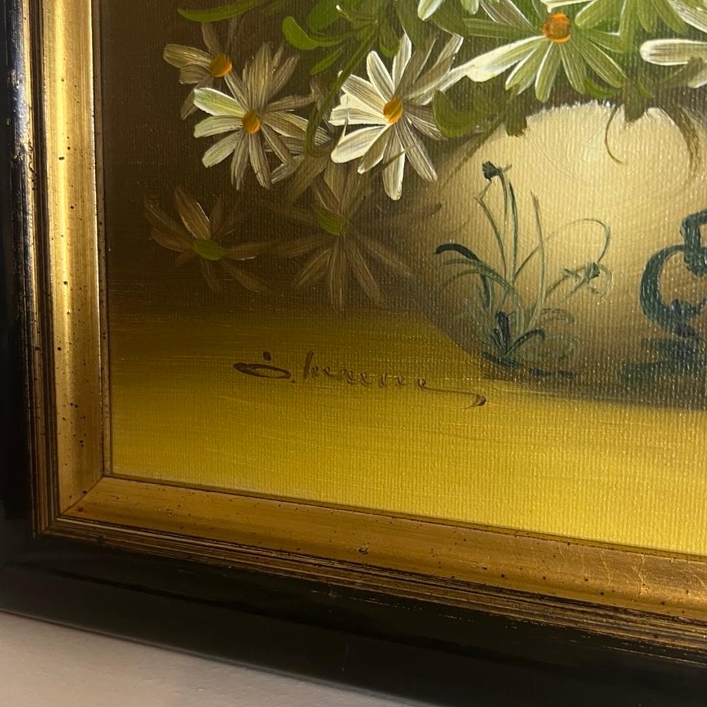 Stunning Signed Original Oil on Canvas Flowers Still Life Vintage Retro Painting Depicting Daysies in a Vase.
________________________

The artwork presents well. Minimal wear to the frame. This is a genuine vintage item, hence signs of history should be expected.

The frame measures 11” tall, 13” wide, and 1¼” deep (28cm x 33cm x 3.5cm).

Let's get this beautiful work of art to become a part of your home!

________________________
Free UK delivery included.

Message us for an international delivery quote.

10% discount if collected in person from N21 1NS, London, UK.
________________________

For more antique and vintage interior decor & fine art please visit our other listings.