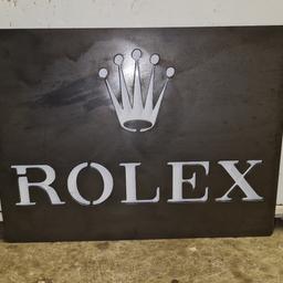 Rustic R o l e x Big Steel Sign Plaque Metal Wall Art custom made from heavy steel measures 40cm by 30cm approx if left outdoors it will rust unless painted or treated I can post if needed or collection le67. thanks